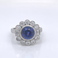 ROUND TANZANITE & DIAMOND PLATINUM RING